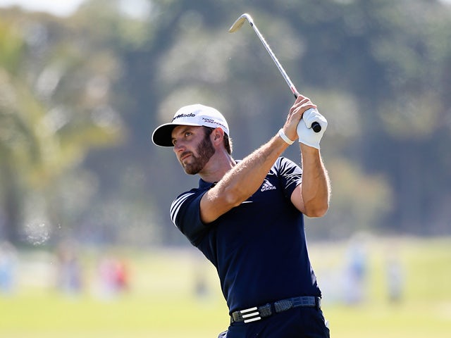 Dustin Johnson at the third hole during the third round of the World Golf Championships-Cadillac Championship on March 8, 2014