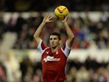 Eric Lichaj of Nottingham Forest taking a throw in during the Sky Bet Championship match between Nottingham Forest and Leeds United at City Ground on December 29, 2013