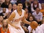 Gerald Green #14 of the Phoenix Suns handles the ball during the NBA game against the Miami Heat at US Airways Center on February 11, 2014
