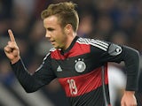 Germany's midfielder Mario Gotze celebrates after he scored during the International friendly football match Germany vs Chile in Stuttgart, southwestern Germany, on March 5, 2014