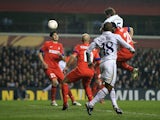Jan Vertonghen of Tottenham Hotspur heads the ball and scores his side's third goal during the UEFA Europa League match against Inter on March 7, 2013