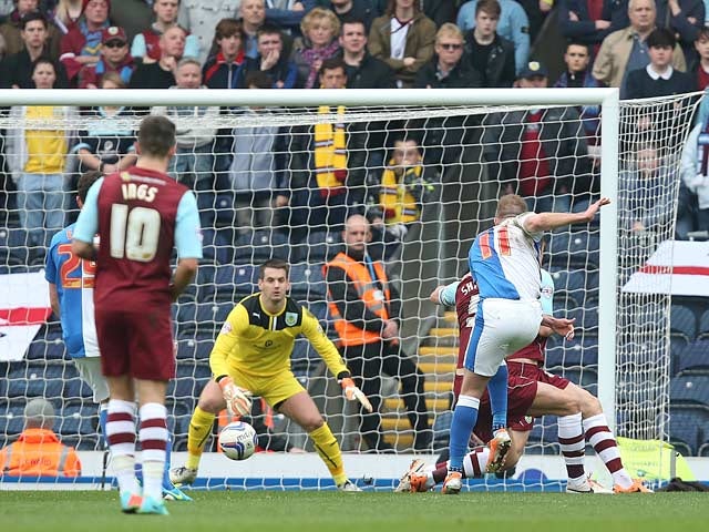 Blackburn's Jordan Rhodes scores the opening goal against Burnley during their Championship match on March 9, 2014