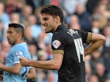 Wigan's Jordi Gomez celebrates after scoring the opening goal against Manchester City during their FA Cup quarter-final match on March 9, 2014