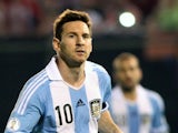Argentina's forward Lionel Messi celebrates after scoring a goal against Paraguay during a Brazil 2014 FIFA World Cup South American qualifier football match at Defensores del Chaco stadium in Asuncion, Paraguay, on September 10, 2013