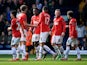 Danny Welbeck of Manchester United celebrates with team mates as he scores their third goal during the Barclays Premier League match between West Bromwich Albion and Manchester United at The Hawthorns on March 8, 2014