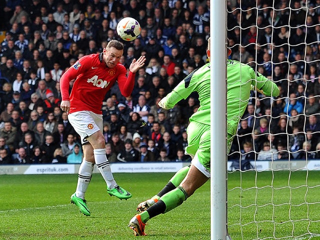Manchester United's English striker Wayne Rooney heads the ball past to score past West Bromwich Albion's English goalkeeper Ben Foster during the English Premier League football match between West Bromwich Albion and Manchester United at The Hawthorns in