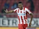 Olympiacos striker collapses on pitch