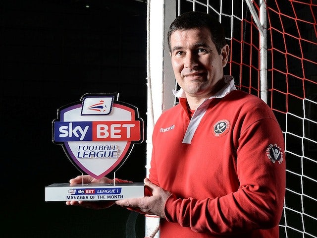 Sheffield United manager Nigel Clough with his February Manager of the Month award on March 6, 2014