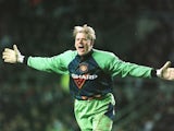 Peter Schmeichel celebrates Eric Cantona's goal for Manchester United against Newcastle United on March 04, 1996.