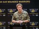 Prince Harry gives a speech at the media launch for the Invictus Games 2014 at the Copper Box Arena in the Olympic Park on March 6, 2014