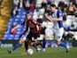 Ravel Morrison of Queens Park Rangers holds off the challenge by Nikola Zigic of Birmingham City during the Sky Bet Championship match between Birmingham City and Queens Park Rangers at St Andrews Stadium on March 8, 2014