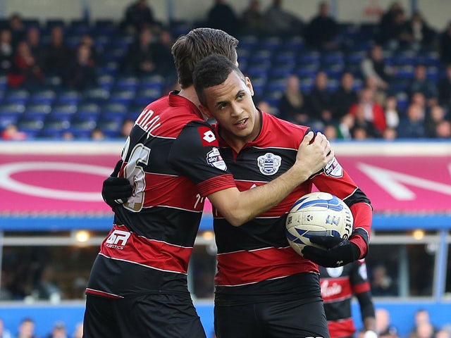 Ravel Morrison of Queens Park Rangers celebrates his goal with Gary O'Neil of Queens Park Rangers during the Sky Bet Championship match between Birmingham City and Queens Park Rangers at St Andrews Stadium on March 8, 2014