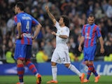 Marcelo of Real Madrid CF celebrates after scoring Real's 2nd goal during the La Liga match between Real Madrid CF and Levante UD at Santiago Bernabeu stadium on March 9, 2014