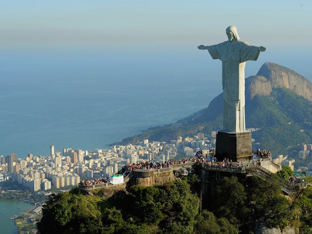 An aerial view of the 'Christ the Redeemer' statue on top of Corcovado mountain on July 27, 2011 in Rio de Janeiro, host city of the 2014 World Cup, Brazil