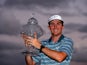 Russell Henley celebrates with the trophy after winning The Honda Classic at PGA National Resort and Spa on March 2, 2014