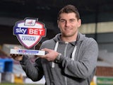 Burnley striker Sam Vokes with his February Player of the Month award on March 6, 2014