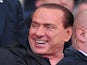 Former Italian Prime Minister Silvio Berlusconi takes place prior the Italian Serie A football match between Parma vs AC Milan at Ennio Tardini Stadium in Parma on March 17, 2012