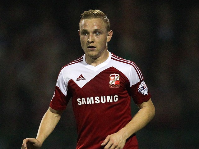 Alex Pritchard of Swindon during the Capital One Cup third round match between Swindon Town and Chelsea at County Ground on September 24, 2013