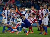 Diego Costa of Atletico de Madrid strikes the ball during the La Liga match between Club Atletico de Madrid and RCD Espanyol at Vicente Calderon Stadium on March 15, 2014