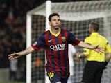 Barcelona's Argentinian forward Lionel Messi celebrates after scoring during the UEFA Champions League round of 16 second leg football match FC Barcelona vs Manchester City at the Camp Nou stadium in Barcelona on March 12, 2014