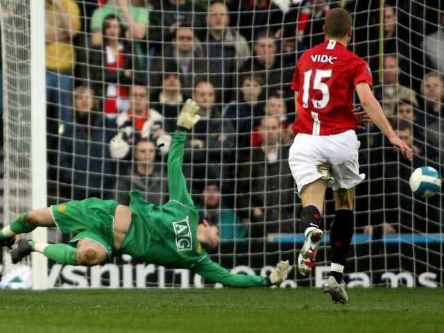 Manchester United goalkeeper Ben Foster makes a save to deny Kenny Miller on March 15, 2008.