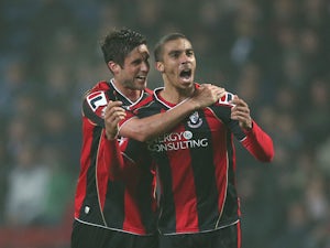Grabban brace fires Bournemouth to win