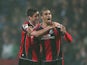 Lewis Grabban of Bournemouth celebrates with a team mate Andrew Surman after scoring the first goal during the Sky Bet Championship match between Blackburn Rovers and Bournemouth at Ewood Park on March 12, 2014