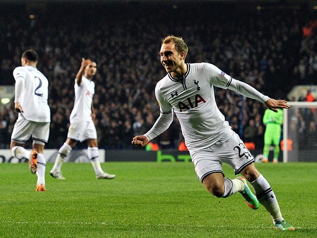 Tottenham's Christian Eriksen celebrates after scoring his team's opening goal against Benfica during their Europa League match on March 13, 2014