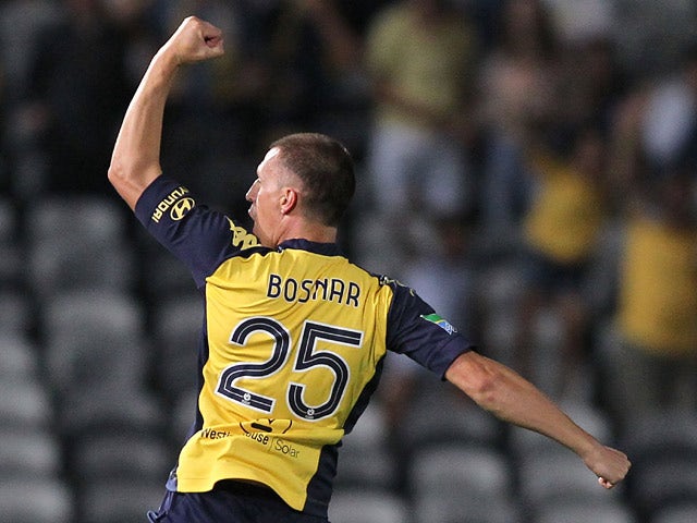 Central Coast's Eddy Bosnar celebrates after scoring the opening goal against Newcastle Jets during their A-League match on March 15, 2014