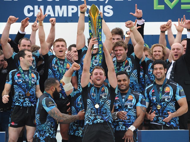 Exeter Chiefs captain Dean Mumm lifts the LV= trophy after their win in the LV= Cup Final between Northampton Saints and Exeter Chiefs at Sandy Park on March 16, 2014