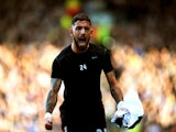 Ashkan Dejagah of Fulham celebrates after scoring the opening goal during the Barclays Premier league match between Fulham and Newcastle United at Craven Cottage on March 15, 2014