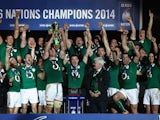 Brian O'Driscoll and captain Paul O'Connell of Ireland celebrate with their team-mates as they lift the trophy after winning the six nations championship with a 22-20 victory over France during the RBS Six Nations match between France and Ireland at Stade