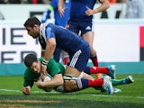 Ireland's Jonny Sexton scores the first try against France during the Six Nations match on March 15, 2014
