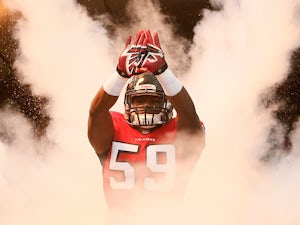 Joplo Bartu #59 of the Atlanta Falcons runs out during player introductions prior to playing against the Tampa Bay Buccaneers on October 20, 2013 