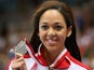 Katarina Johnson-Thompson of Great Britain poses with her silver medal in the Women's Long Jump Final during the medal ceremony on day three of the IAAF World Indoor Championships at Ergo Arena on March 9, 2014
