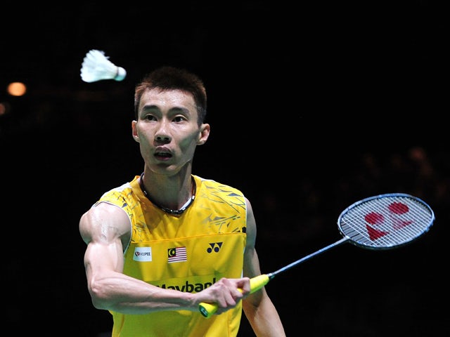 Lee Chong Wei of Malaysia returns against Chen Long of China in their All England Open Badminton Championships men's singles final match in Birmingham, central England, on March 9, 2014