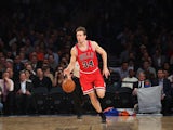 Mike Dunleavy #34 of the Chicago Bulls dribbles the ball against the New York Knicks at Madison Square Garden on December 11, 2013