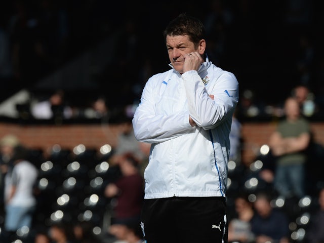 John Carver, Assistant Manager of Newcastle United looks on during the Barclays Premier League match between Fulham and Newcastle United at Craven Cottage on March 15, 2014