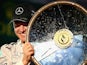 Nico Rosberg of Germany and Mercedes GP celebrates on the podium after winning the Australian Formula One Grand Prix at Albert Park on March 16, 2014
