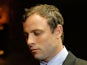 South African athlete Oscar Pistorius appears in Pretoria Magistrates Court for an indictment hearing on August 19, 2013