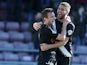 Doug Loft of Port Vale celebrates with team mate Ben Williamson #19 after scoring his sides 1st goal during the Sky Bet League One match between Coventry City and Port Vale at Sixfields on March 16, 2014