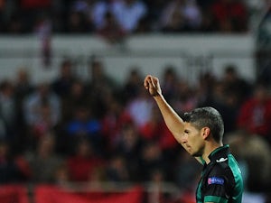 Sevilla strike sinks Getafe in opener