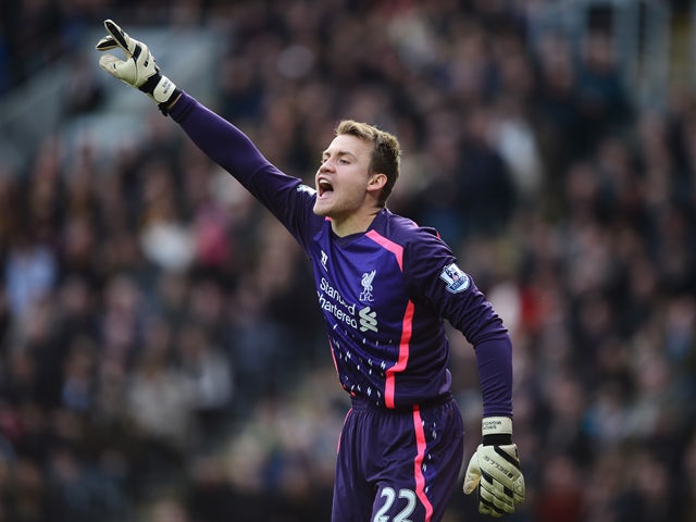 Goalkeeper Simon Mignolet of Liverpool gives instructions during the Barclays Premier League match between Hull City and Liverpool at KC Stadium on December 1, 2013