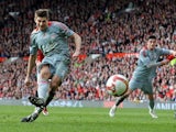 Liverpool's Steven Gerrard scores his team's second goal via the penalty spot against Manchester United during their Premier League match on March 14, 2009