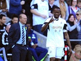 Roland Lamah of Swansea City celebrates his goal during the Barclays Premier League match between Swansea City and West Bromwich Albion at Liberty Stadium on March 15, 2014