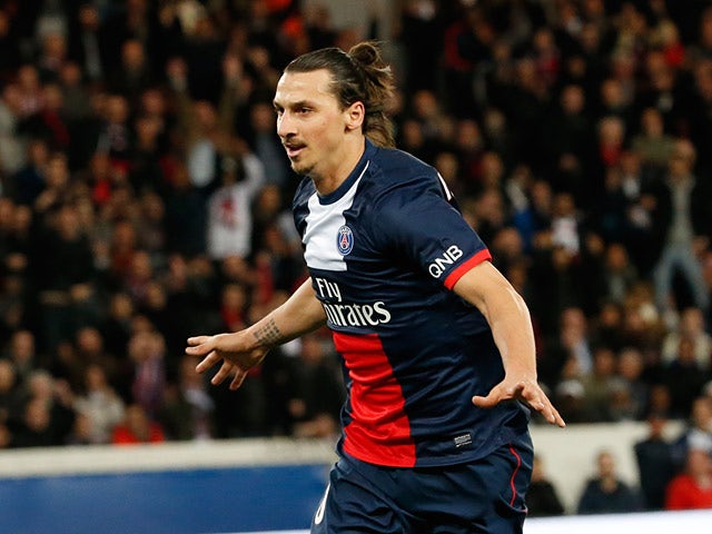PSG's Zlatan Ibrahimovic celebrates after scoring the opening goal against Saint-Etienne during the Ligue 1 match on March 16, 2014