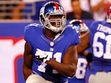 Adewale Ojomo #71 of the New York Giants in action against the New England Patriots during an NFL pre-season game on August 29, 2012