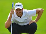 Alejandro Canizares of Spain lines up a putt during the final round of the Trophee Hassan II Golf at Golf du Palais Royal on March 16, 2014