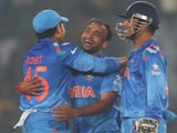 India's Amit Mishra celebrates after dismissing Marlon Samuels of the West Indies during the ICC World Twenty20 Bangladesh 2014 match on March 23, 2014