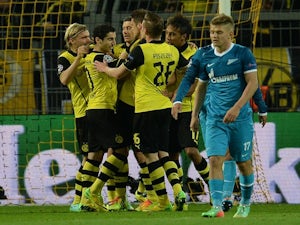 Dortmund progress despite loss
